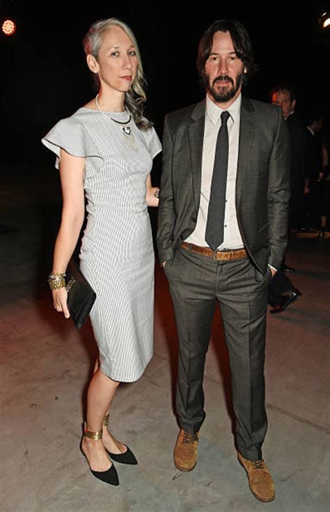 Artist Alexandra Grant (L) and Keanu Reeves attend the UNAIDS Gala ...