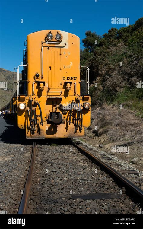 New Zealand, Dunedin, Dunedin Railways Taieri Gorge scenic train. Yellow diesel-electric class ...