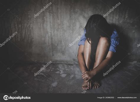 Sad little girl sitting against the wall in despair. — Stock Photo © doidam10 #263862502