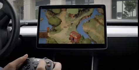 First look at Tesla's new in-car video game system with Cuphead and ...