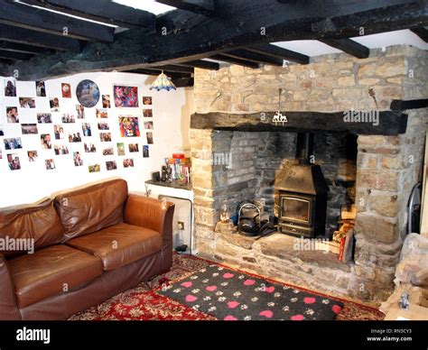 Fireplace in an old cottage, UK Stock Photo - Alamy