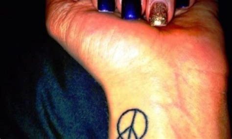 71 Superb Peace Wrist Tattoo Photos