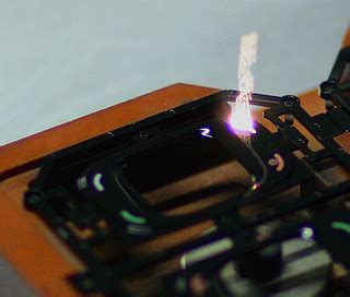 Laser Etching | Burning small "phone" icons onto plastic key… | Flickr