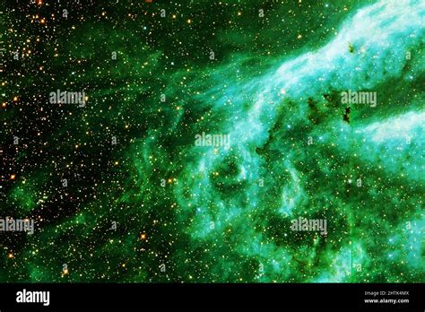 Beautiful space nebula of green color. Elements of this image were furnished by NASA Stock Photo ...