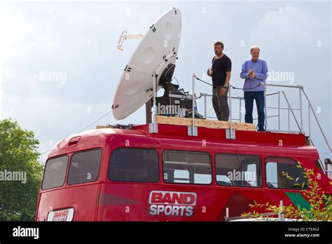 Television technicians aboard a television network satellite bus during the London 2012 Olympic ...