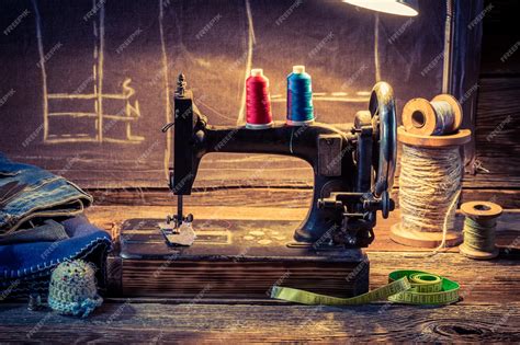 Premium Photo | Vintage tailor workshop with sewing machine cloth and ...