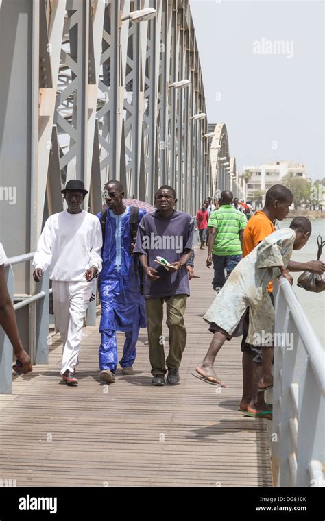 Senegal, Saint Louis. Pedestrians on the Pont Faidherbe, Bridge over ...