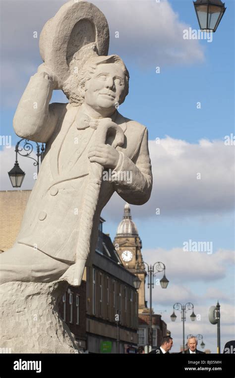 Ernie Wise statue and Morley town hall clock, Leeds Stock Photo - Alamy