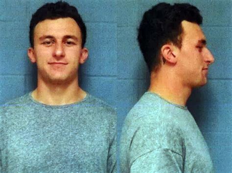 Johnny Manziel mugshot released: QB booked for domestic violence - Sports Illustrated