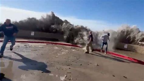 Watch As Huge Wave Chases Beachgoers - Videos from The Weather Channel