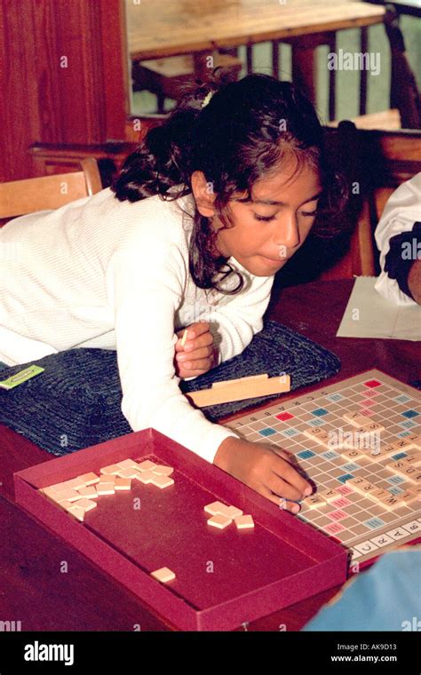 Family playing scrabble hi-res stock photography and images - Alamy