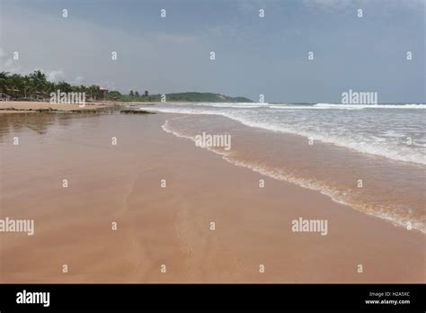 Deserted undeveloped golden sandy beach at Busua Beach in Ghana Stock ...