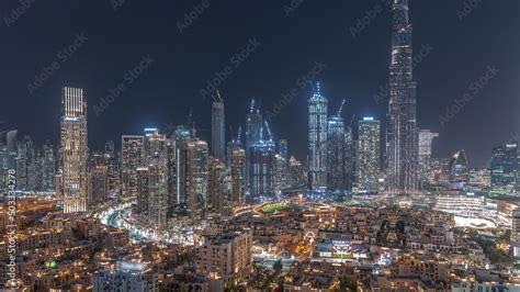 Dubai Downtown night timelapse with tallest skyscraper and other towers Stock Photo | Adobe Stock