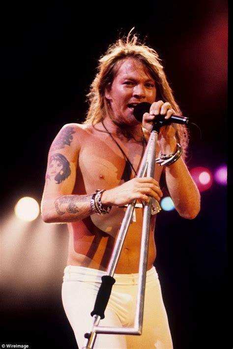 Guns N' Wheelchairs? Axl Rose, 54, is pushed onto Las Vegas stage ...