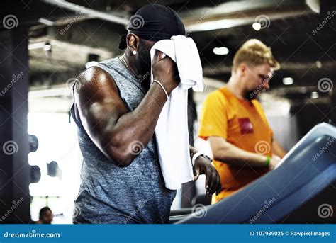 People Exercising at Fitness Gym Stock Image - Image of ghanian ...