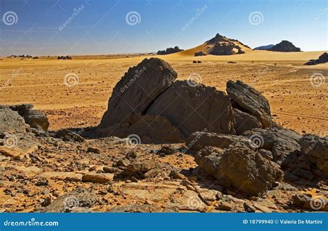 Rocks in desert landscape stock photo. Image of akakus - 18799940