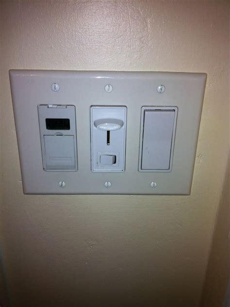 GEN3 Electric, Heating & Air Conditioning (215) 352-5963: Three different types of light switches.