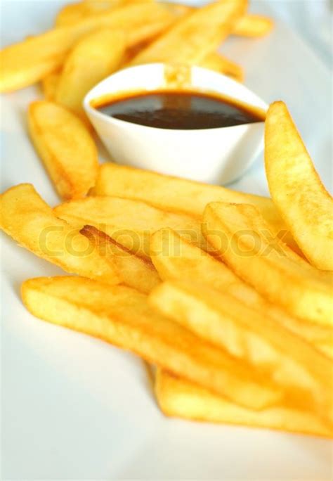 French Fries with Barbecue dipping | Stock image | Colourbox