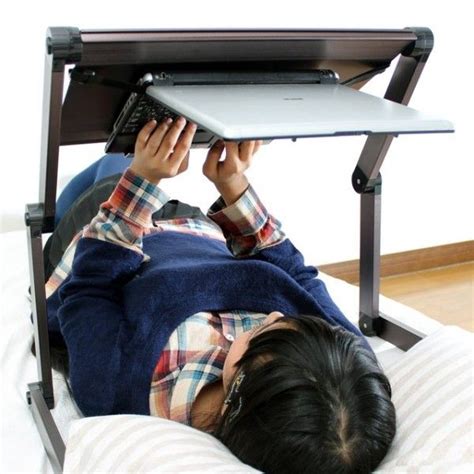 Lying Down Laptop Stand | Laptop stand, Laptop desk, Cool inventions