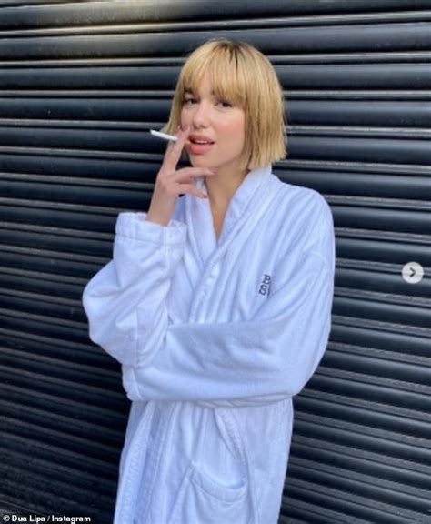 Dua Lipa debuts blonde bob and poses with a cigarette in new snaps ...