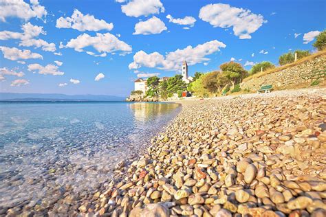 Bol on Brac island. Monastery on pebble beach in Bol view Photograph by ...