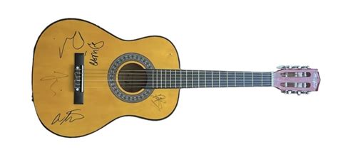 Foo Fighters Signed Acoustic Guitar - CharityStars