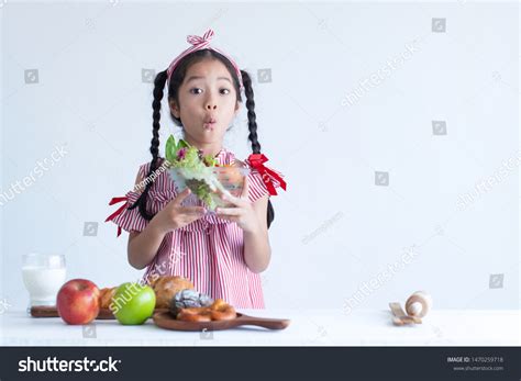 Happy Asian Girl Cooking Healthy Food Stock Photo 1470259718 | Shutterstock