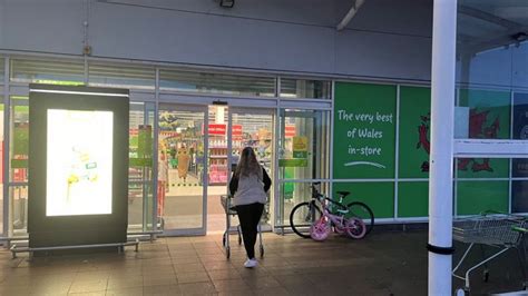 Llandudno Asda shoppers say trolley wheel lock causes injury - BBC News