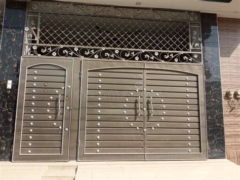 Steel House Front Gate Grill Design Images : Golden door handle, white ...