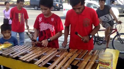 Amazing Filipino music using a self-made bamboo instrument by a father ...