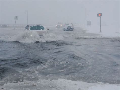 Snowstorm floods Boston Harbor and coastal Massachusetts streets with ...