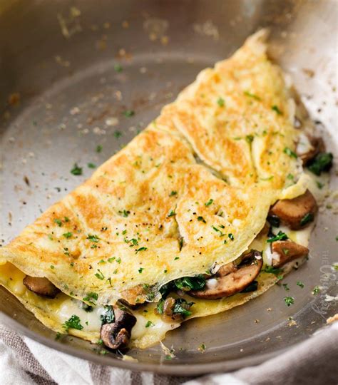 Cheesy Mushroom and Spinach Omelet - The Chunky Chef | Omlet recipes, Veggie omelet, Stuffed ...