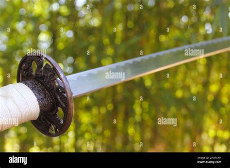 Katana Sword and Bamboo Stock Photo - Alamy