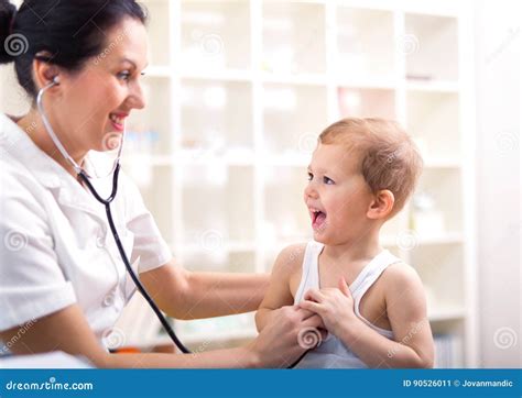 Happy Little Boy at the Doctor for a Checkup Stock Image - Image of ...