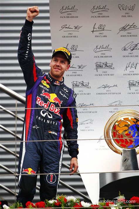 Race winner Sebastian Vettel punches the air | Main gallery | Photos ...