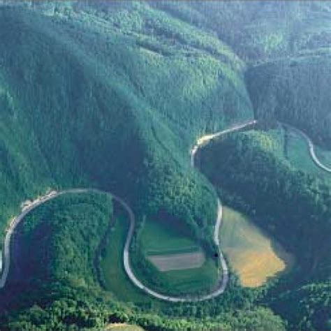 Picturesque entrenched meanders of the Mirna River in the low Kr{ko ...