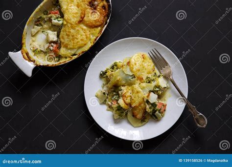 Fish Pie with Sliced Potato Topping Stock Photo - Image of haddock ...