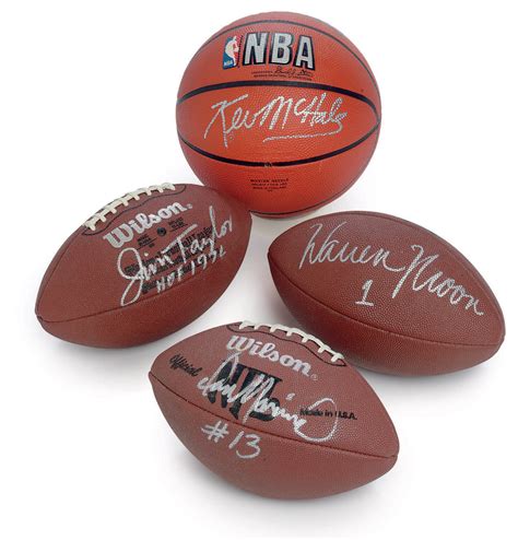 A GROUP OF FOUR AUTOGRAPHED SPORTS MEMORABILIA | Christie's