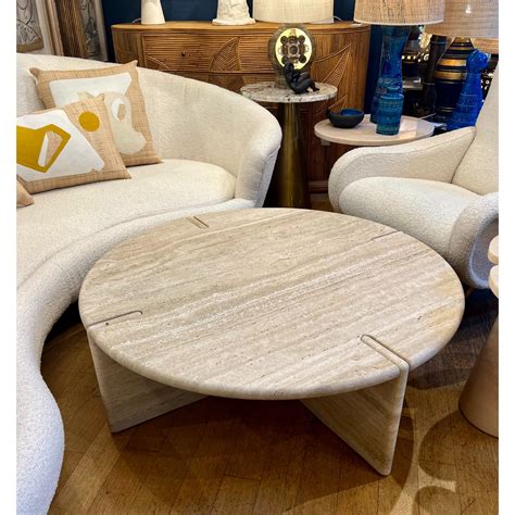 Large round travertine coffee table