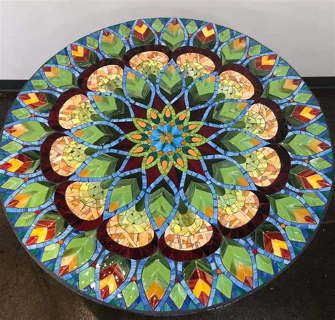 a circular table with colorful designs on it