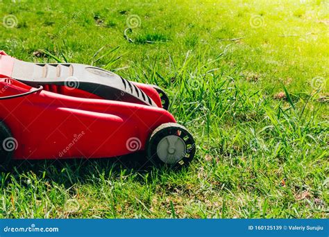 Red lawn mower stock image. Image of garden, gardener - 160125139