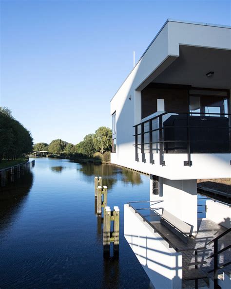 Amsterdam’s historic bridge houses transformed into micro hotel suites | Archello