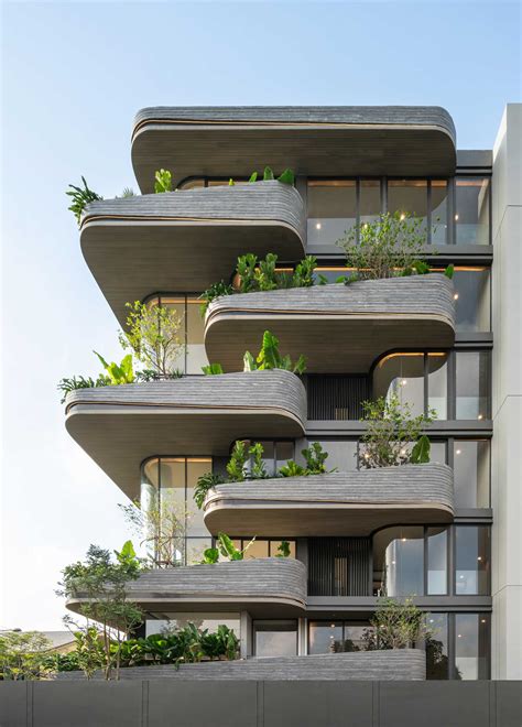 Lighting Is Used To Highlight The Rounded Balconies Of This Building - Architecture Collection