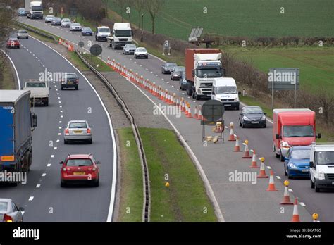 Traffic queuing in a contraflow Stock Photo - Alamy