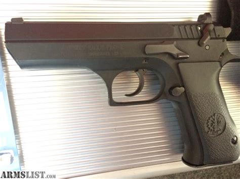 ARMSLIST - For Sale: Israeli Baby Eagle 9MM + Holster + Grips