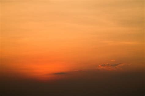 Premium Photo | Clouds In Orange Sky