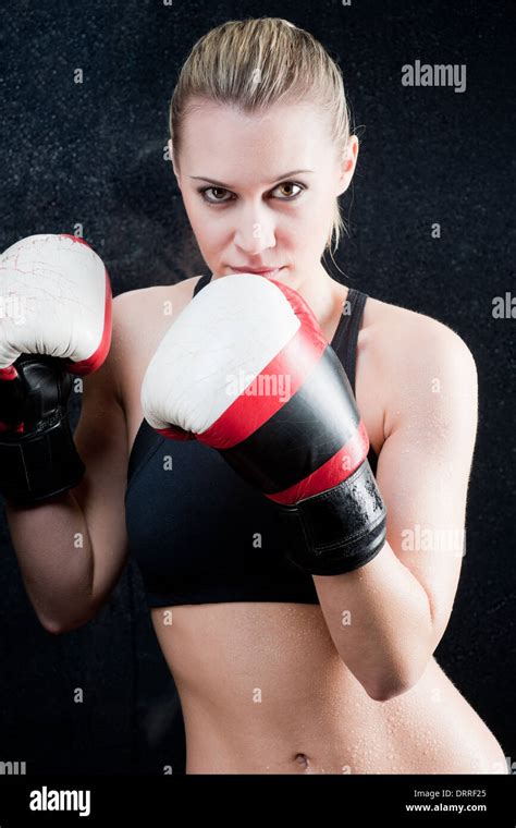 Boxing training woman with gloves in gym Stock Photo - Alamy