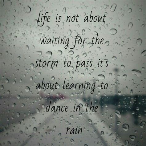 rain drops on the window with an inspirational quote about life is not ...