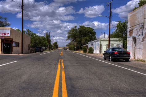 Road Out Of Town. Infinity perspective of a small town road. #road #perspective #travel | Towns ...