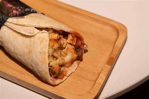 Chicken Kebab Roll on Wooden Plate Stock Photo - Image of table, tomato: 194325640